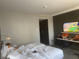 Max playing `Pokémon Shield` on the Nintendo Switch in our room at the Pullman Paris La Défense hotel