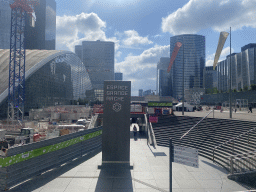 Staircase to the La Défense railway station and skyscrapers at the Parvis de la Défense square