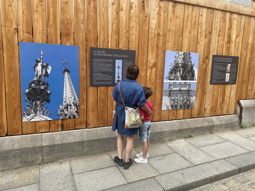 Miaomiao and Max with information on the southwest side of the Sainte-Chapelle chapel