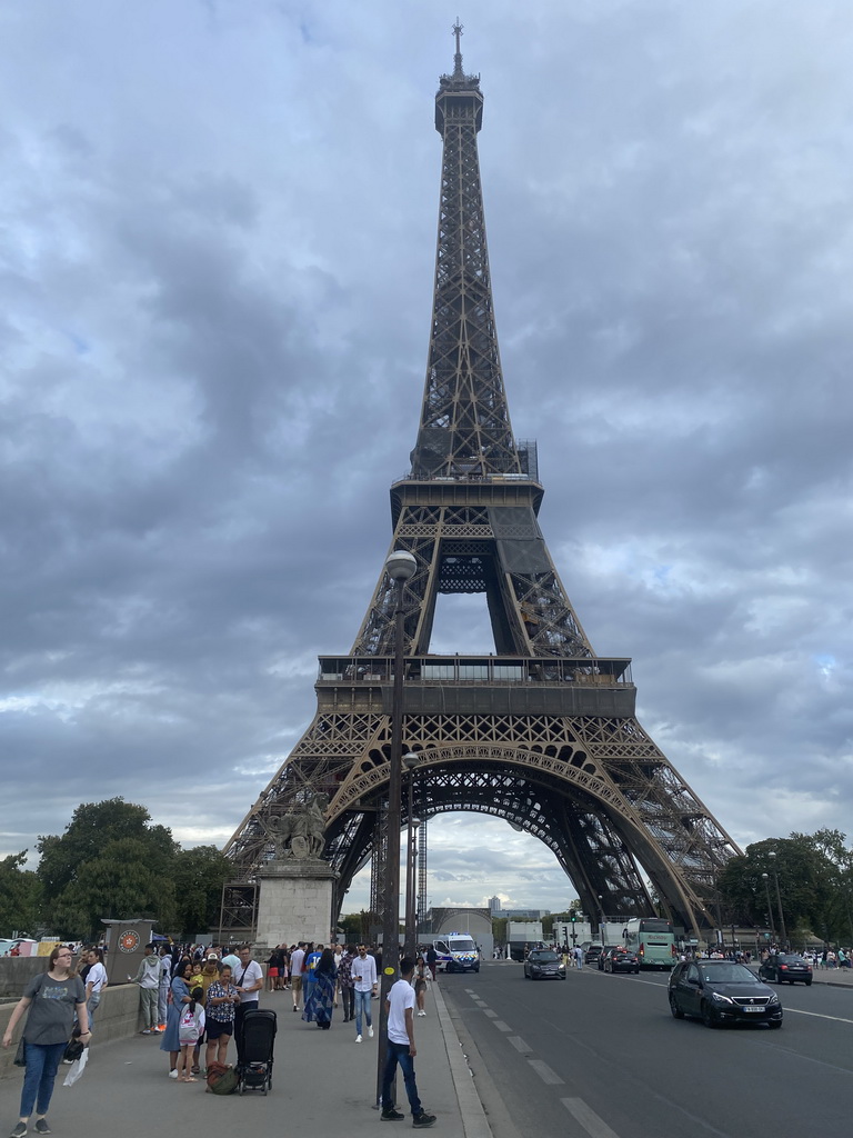 The northwest side of the Eiffel Tower, viewed from the Pont d`Iéna bridge over the Seine river