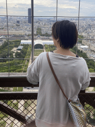 Mioaomiao at the Second Floor of the Eiffel Tower, with a view on the Jardin de la Tour Eiffel garden, the Champ de Mars park, the Grand Palais Éphémère exhibition hall and the Tour Montparnasse tower