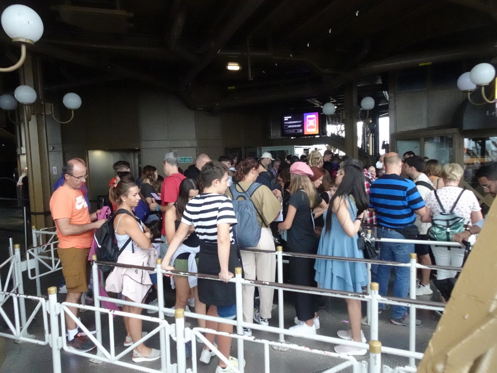 People waiting in line for the elevator from the Second Floor to the Top Floor of the Eiffel Tower