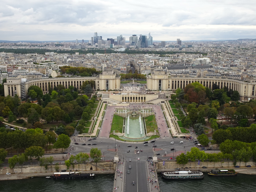 The Pont d`Iéna bridge over the Seine river, the Jardins du Trocadéro gardens, the Palais de Chaillot palace, the Bois de Boulogne park with the Louis Vuitton Foundation museum and the La Défense district with the Grande Arche de la Défense building, viewed from the Second Floor of the Eiffel Tower