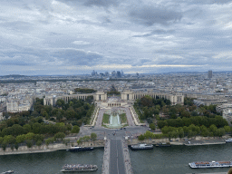 The Pont d`Iéna bridge over the Seine river, the Jardins du Trocadéro gardens, the Palais de Chaillot palace, the Bois de Boulogne park with the Louis Vuitton Foundation museum and the La Défense district with the Grande Arche de la Défense building, viewed from the Second Floor of the Eiffel Tower