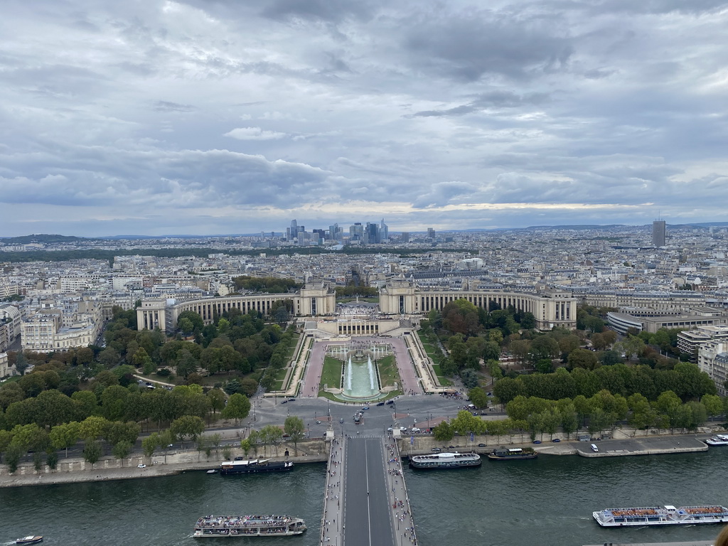 The Pont d`Iéna bridge over the Seine river, the Jardins du Trocadéro gardens, the Palais de Chaillot palace, the Bois de Boulogne park with the Louis Vuitton Foundation museum and the La Défense district with the Grande Arche de la Défense building, viewed from the Second Floor of the Eiffel Tower