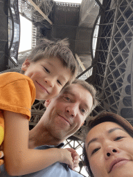 Tim, Miaomiao and Max at the Ground Floor of the Eiffel Tower, with a view on the First Floor and Second Floor