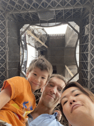 Tim, Miaomiao and Max at the Ground Floor of the Eiffel Tower, with a view on the First Floor and Second Floor