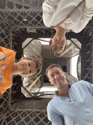 Tim, Miaomiao and Max at the Ground Floor of the Eiffel Tower, with a view on the First Floor and Second Floor