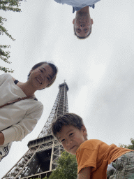 Tim, Miaomiao and Max at the Jardin de la Tour Eiffel garden, with a view on the northeast side of the Eiffel Tower