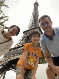 Tim, Miaomiao and Max at the Jardin de la Tour Eiffel garden, with a view on the northeast side of the Eiffel Tower