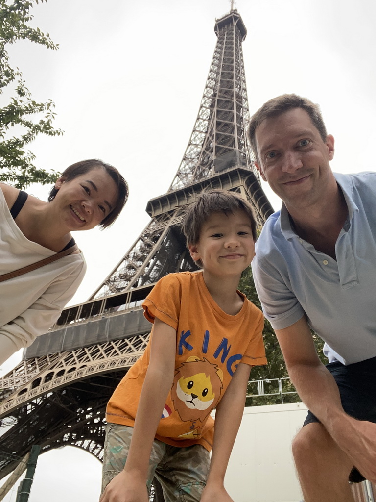 Tim, Miaomiao and Max at the Jardin de la Tour Eiffel garden, with a view on the northeast side of the Eiffel Tower