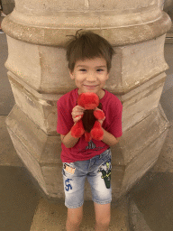 Max with a plush toy at the Hall of the Men-at-arms at the Conciergerie building