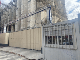 Gate at the north side of the Cathedral Notre Dame de Paris at the crossing of the Rue d`Arcole and Rue du Cloître-Notre-Dame streets