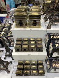 Scale models of the Arc de Triomphe and the Eiffel Tower at the souvenir shop inside the Arc de Triomphe