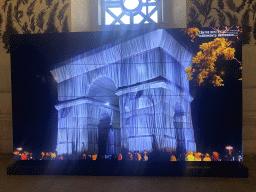 Screen with an image of an illuminated Arc de Triomphe at the museum inside the Arc de Triomphe