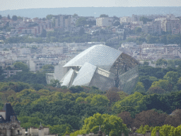 The Louis Vuitton Foundation museum at the Bois de Boulogne park, viewed from the roof of the Arc de Triomphe