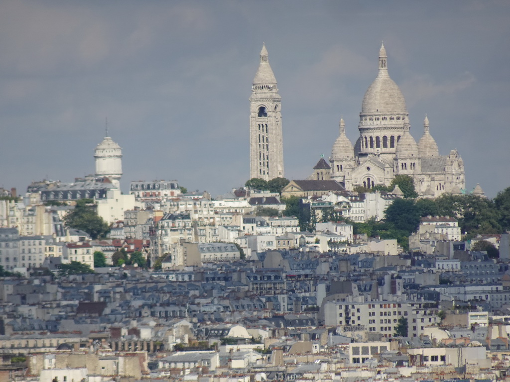 The Basilique du Sacré-Coeur church on the Montmartre hill, viewed from the roof of the Arc de Triomphe