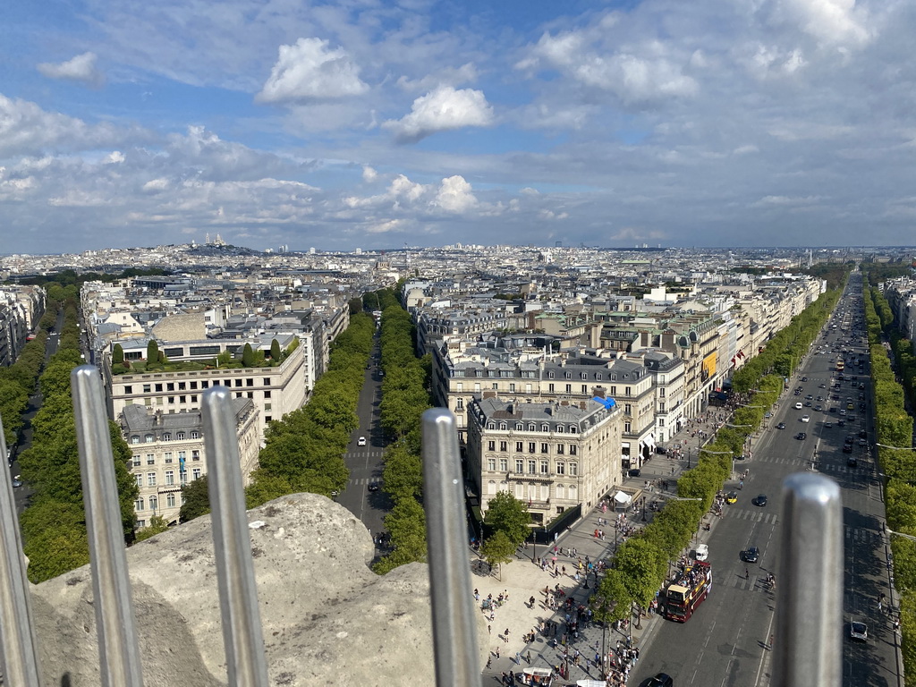 The Avenue Hoche, the Avenue de Friedland, the Avenue des Champs-Élysées, the Montmartre hill with the Basilique du Sacré-Coeur church, the Église Saint-Augustin church and the Louvre Musuem, viewed from the roof of the Arc de Triomphe