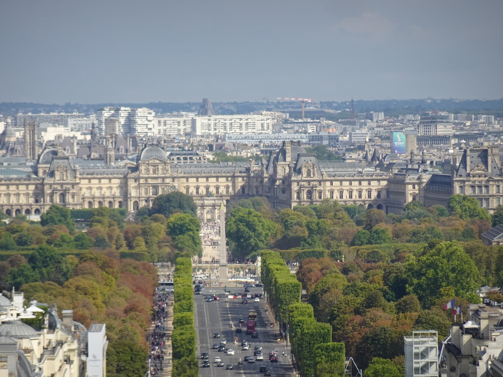 The Avenue des Champs-Élysées, the Place de la Concorde square with the Luxor Obelisk and the Louvre Museum, viewed from the roof of the Arc de Triomphe