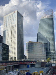 Front of the Pullman Paris La Défense hotel and skyscrapers at the Avenue de l`Arche, viewed from the Parvis de la Défense square