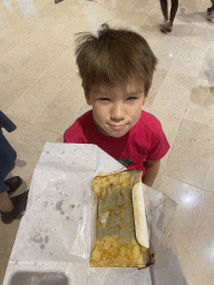 Max with a crêpe at the Third Floor of the Westfield Les 4 Temps shopping mall