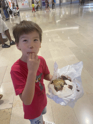 Max with a crêpe at the Second Floor of the Westfield Les 4 Temps shopping mall