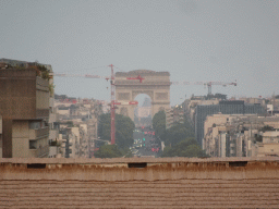 The Arc de Triomphe, viewed from below the Grande Arche de la Défense building, at sunset