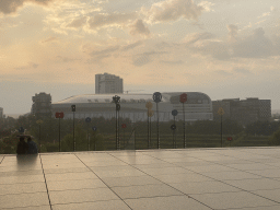 The Paris La Défense Arena, viewed from below the Grande Arche de la Défense building, at sunset