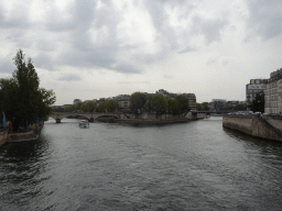 The Pont Louis-Philippe and Pont Saint-Louis bridges over the Seine river and the Île Saint-Louis island, viewed from the Pont d`Arcole bridge