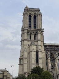 The southwest tower of the Cathedral Notre Dame de Paris, under renovation, viewed from the Quai de Montebello street