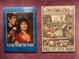 Old movie posters for `Notre-Dame de Paris` films at the Archaeological Crypt of the Île de la Cité