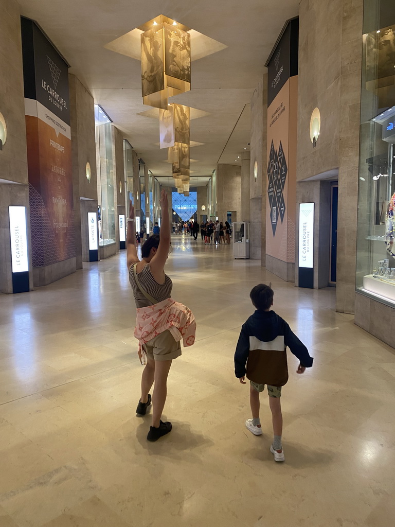 Miaomiao and Max at the Allée de Rivoli street at the Lower Floor of the Carrousel du Louvre shopping mall