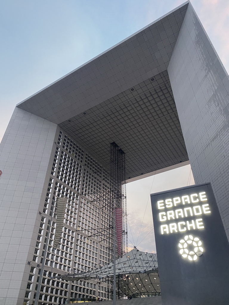 Facade of the Grande Arche de la Défense building. viewed from the Parvis de la Défense square, at sunset