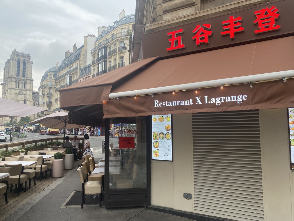Front of the Restaurant X Lagrange at the Rue du Fouarre street, with a view on the Cathedral Notre Dame de Paris