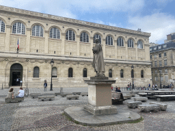 The statue of Pierre Corneille in front of the Bibliothèque Sainte-Geneviève library at the Place du Panthéon square