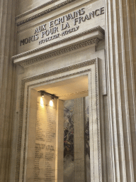 Gate with inscriptions of the names of people who died in World War II at the right side of the apse of the Panthéon