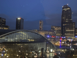 The Parvis de la Défense square with the CNIT shopping mall, the Le Pouce statue and the Westfield Les 4 Temps shopping mall and the Tour Hekla tower, viewed from the window of our room at the Pullman Paris La Défense hotel, by night