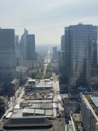 Skyscrapers at the La Défense district, the La Défense railway station, the Avenue Charles de Gaulle and the Arc de Triomphe, viewed from the observation deck at the top floor of the Grande Arche de la Défense building