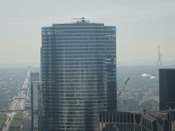 The Tour EDF tower, the Avenue Charles de Gaulle, the Arc de Triomphe, the Louis Vuitton Foundation museum and the Eiffel Tower, viewed from the observation deck at the top floor of the Grande Arche de la Défense building