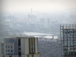 The Pont de Levallois and the Pont Ferroviaire d`Asnières bridges over the Seine river, viewed from the observation deck at the top floor of the Grande Arche de la Défense building