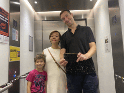 Tim, Miaomiao and Max at the elevator of the Grande Arche de la Défense building