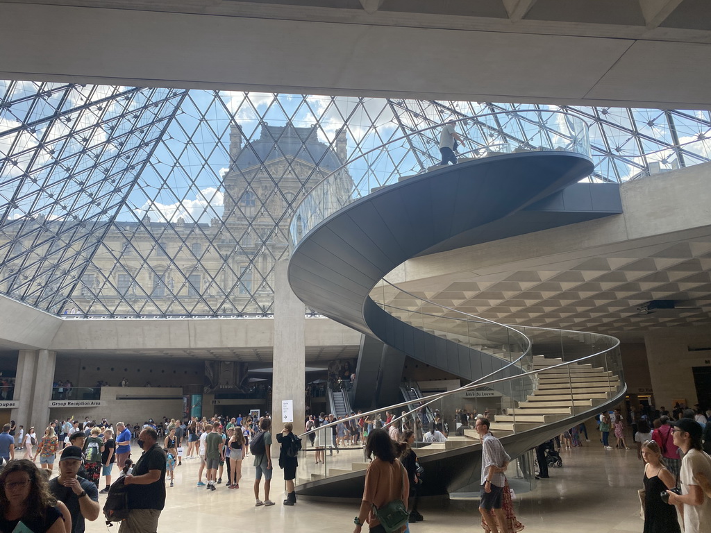 Staircase from the lobby at the Lower Ground Floor of the Louvre Museum to the Louvre Pyramid at the Cour Napoleon courtyard, with a view on the Denon Wing