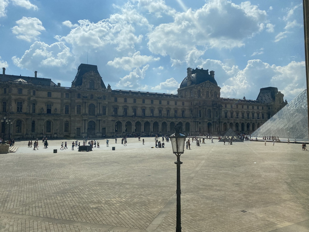 The Louvre Pyramid at the Cour Napoleon courtyard and the Denon Wing of the Louvre Museum, viewed from the Ground Floor of the Richelieu Wing
