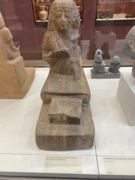 Statue of High Priest Neferronpet at the First Floor of the Sully Wing of the Louvre Museum, with explanation