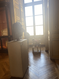 Max on a chair at the First Floor of the Sully Wing of the Louvre Museum