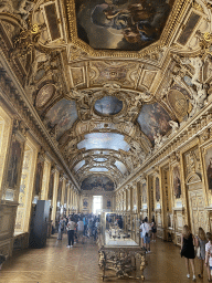 Paintings and French crown jewels at the Galerie d`Apollon gallery at the First Floor of the Denon Wing of the Louvre Museum