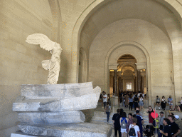 The statue `Winged Victory of Samothrace` at the Daru Staircase at the Denon Wing of the Louvre Museum