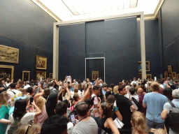 Painting `Mona Lisa` by Leonardo da Vinci and other paintings at the First Floor of the Denon Wing of the Louvre Museum