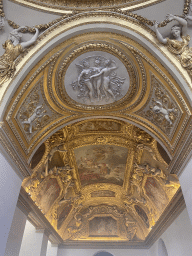 Paintings and reliefs on the ceiling at the Ground Floor of the Sully Wing of the Louvre Museum