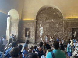 Statue `Venus de Milo` and other sculptures at the Parthenon Room at the Ground Floor of the Sully Wing of the Louvre Museum